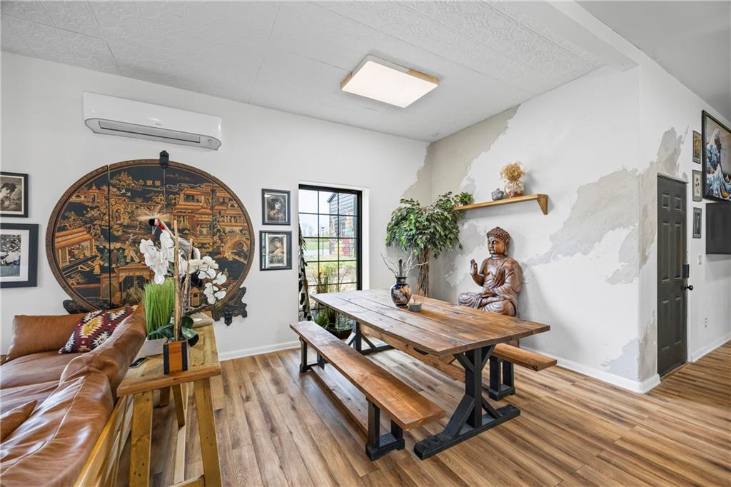 356 West Oak Grove Road Northwest Adairsville, GA 30103 - Photo 15 of 128 a workspace with furniture hardwood and a window