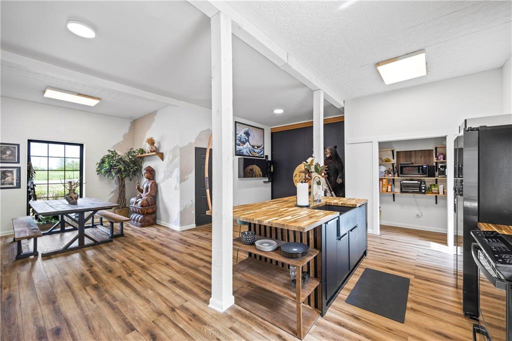 356 West Oak Grove Road Northwest Adairsville, GA 30103 - Photo 22 of 128 a living room with furniture and a wooden floor