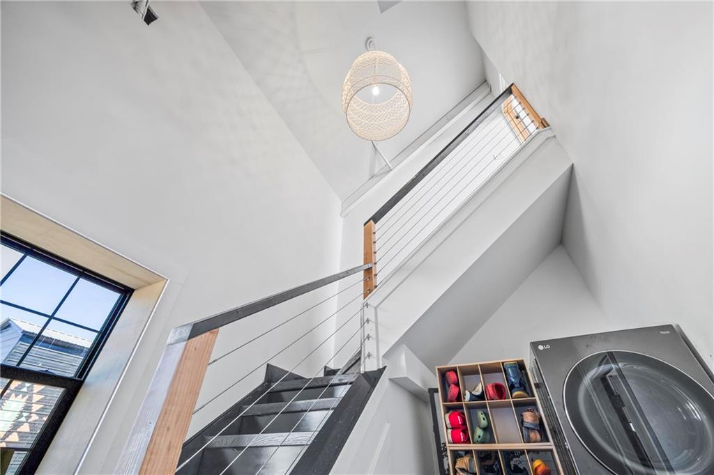 356 West Oak Grove Road Northwest Adairsville, GA 30103 - Photo 32 of 128 a view of walk in closet with clothes and shoes