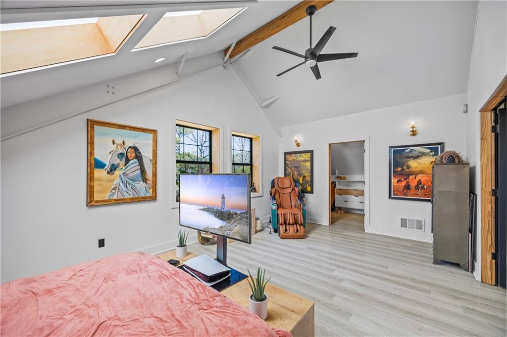 356 West Oak Grove Road Northwest Adairsville, GA 30103 - Photo 37 of 128 a bedroom with furniture and a ceiling fan