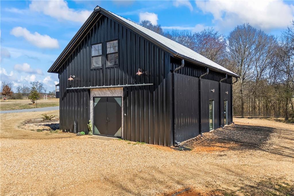 356 West Oak Grove Road Northwest Adairsville, GA 30103 - Photo 53 of 128 a view of a house with a wooden fence