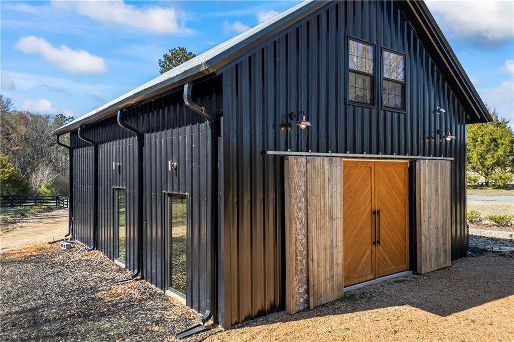 356 West Oak Grove Road Northwest Adairsville, GA 30103 - Photo 54 of 128 a view of a house with backyard and trees