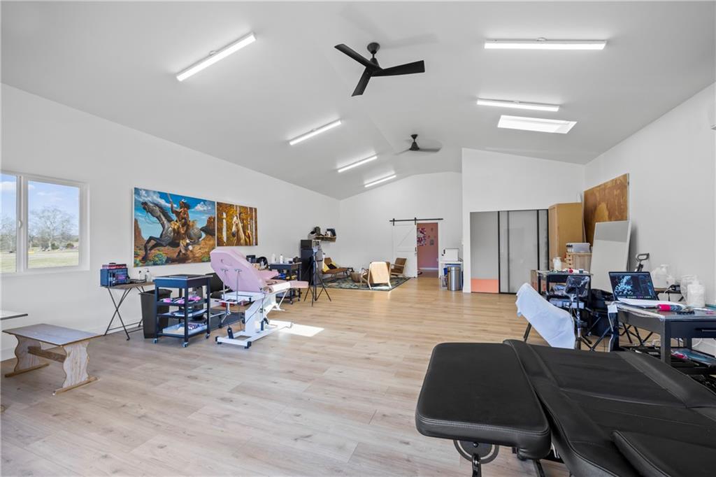 356 West Oak Grove Road Northwest Adairsville, GA 30103 - Photo 68 of 128 a living room with furniture and wooden floor