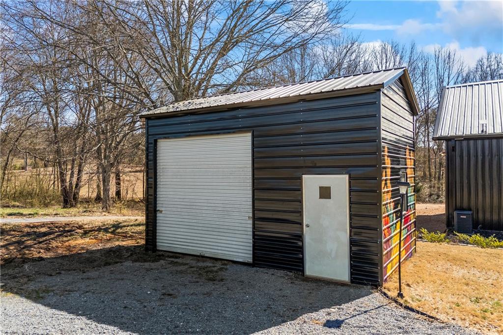 356 West Oak Grove Road Northwest Adairsville, GA 30103 - Photo 74 of 128 a view of a house with a yard