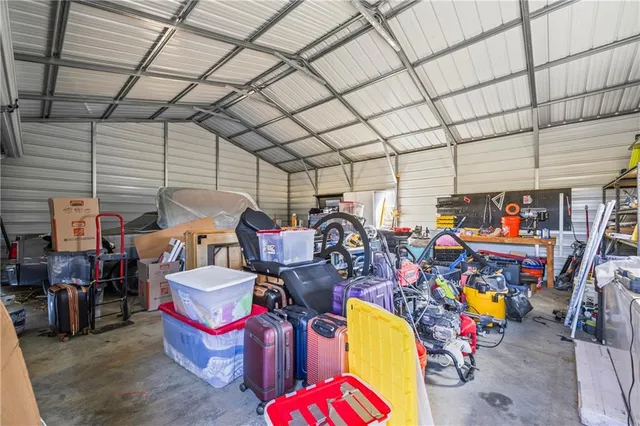 a view of swimming pool with outdoor seating