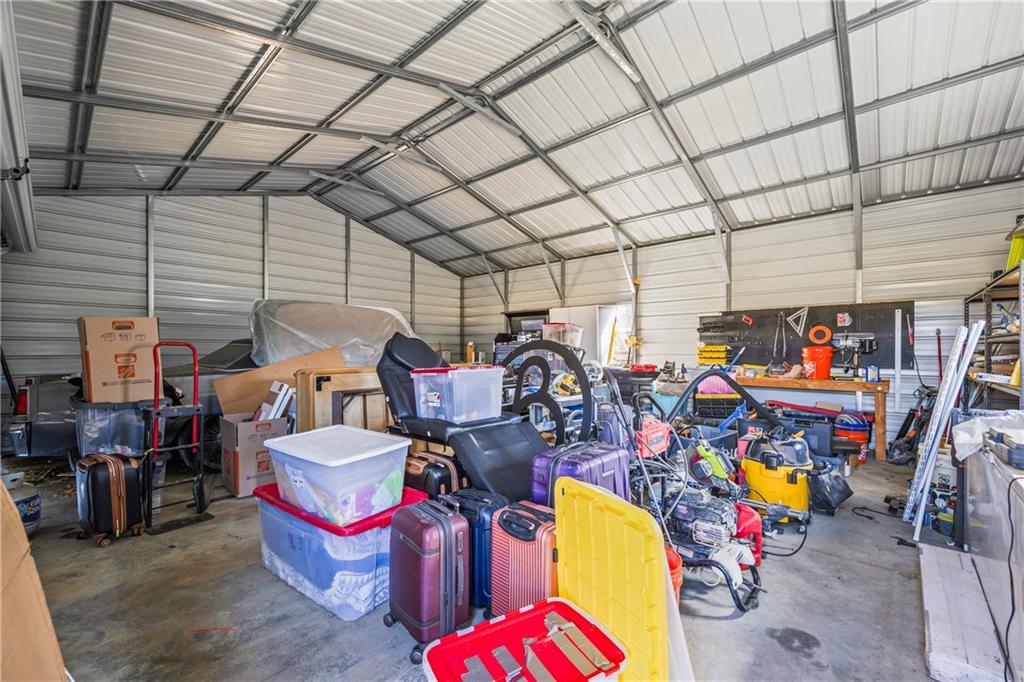 356 West Oak Grove Road Northwest Adairsville, GA 30103 - Photo 77 of 128 a group of people sitting in a room