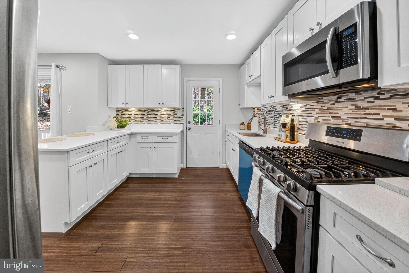 6802 Niles Drive Laurel, MD 20707 - Photo 11 of 31 Modern Kitchen with Sleek Finishes