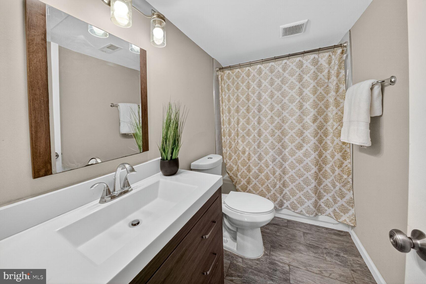 6802 Niles Drive Laurel, MD 20707 - Photo 23 of 31 Updated Bathroom with Elegant Finishes