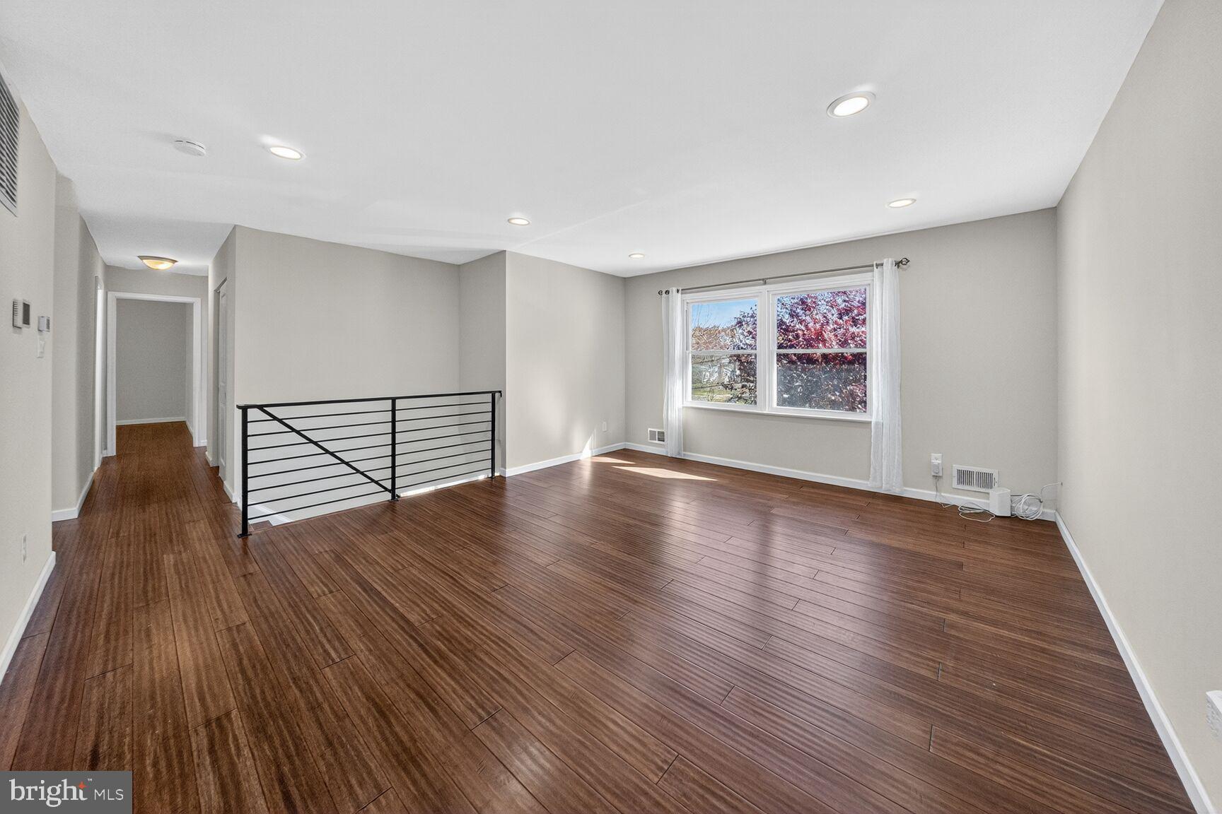 6802 Niles Drive Laurel, MD 20707 - Photo 5 of 31 Spacious, Sunlit Living Area with a Modern Flair