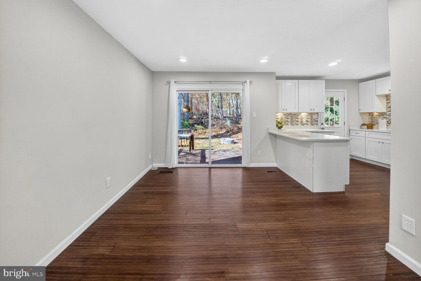 6802 Niles Drive Laurel, MD 20707 - Photo 7 of 31 Bright, Open Dining Space with Access to the Deck