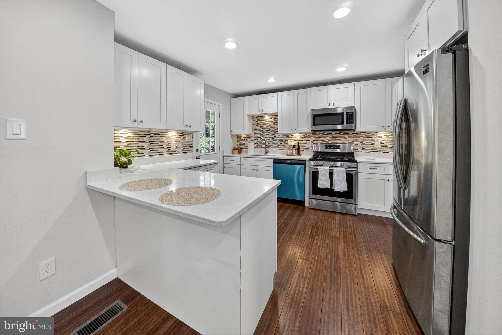 6802 Niles Drive Laurel, MD 20707 - Photo 8 of 31 Updated Kitchen with Quartz Counters and Stainless