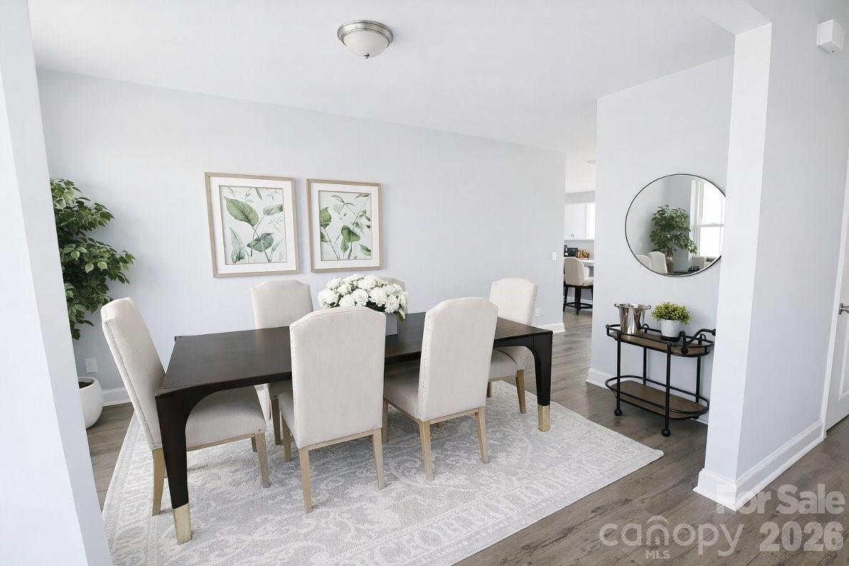 1022 Heath Helms Road Monroe, NC 28110 - Photo 8 of 10 a view of a dining room with furniture