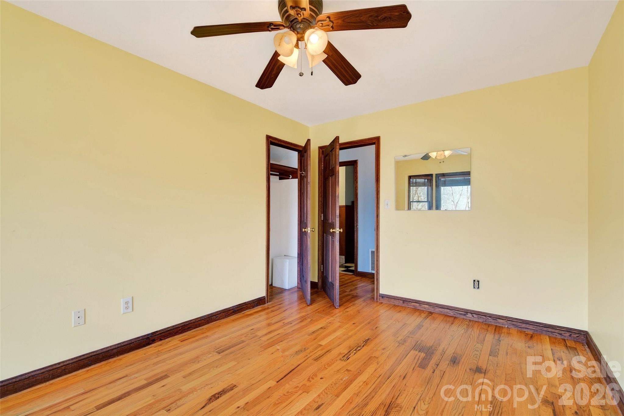 169 Hilltop Road Black Mountain, NC 28711 - Photo 28 of 48 a view of empty room with wooden floor