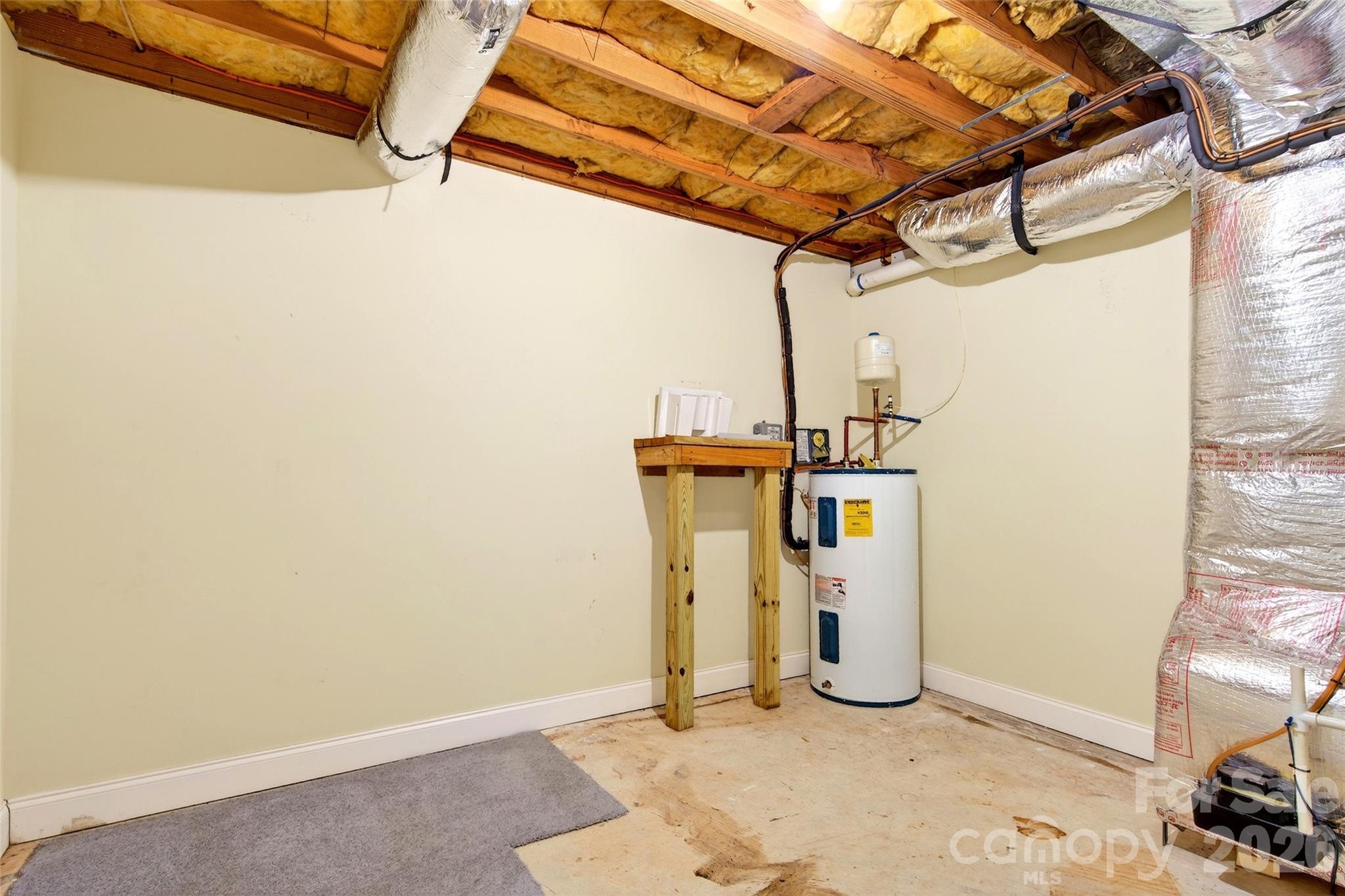 169 Hilltop Road Black Mountain, NC 28711 - Photo 44 of 48 a view of a room with wooden walls