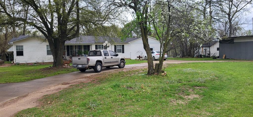 5427 Fm 69 Como, TX 75431 - Photo 2 of 38 a view of a house with backyard and a tree