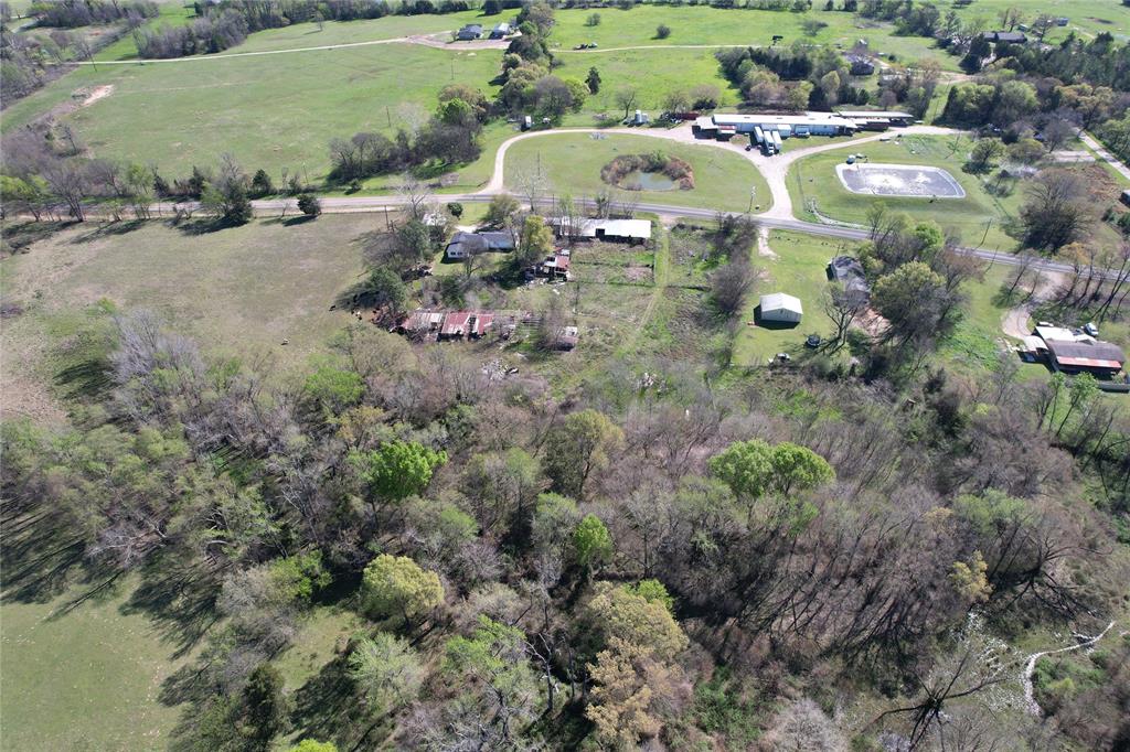 5427 Fm 69 Como, TX 75431 - Photo 35 of 38 an aerial view of a swimming pool with outdoor seating and yard