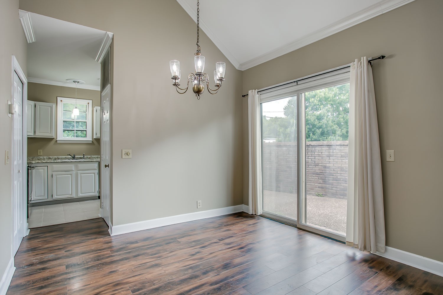 1129 West Main Street, Unit 1 Franklin, TN 37064 - Photo 14 of 30 wooden floor in an empty room with a window