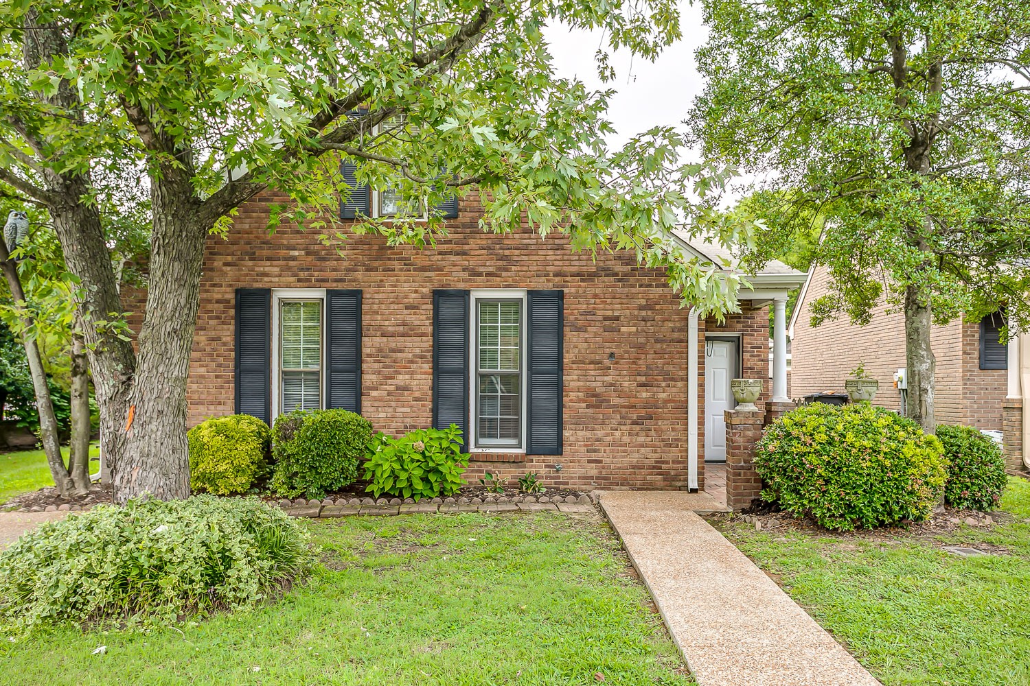 1129 West Main Street, Unit 1 Franklin, TN 37064 - Photo 2 of 30 front view of a house with a yard