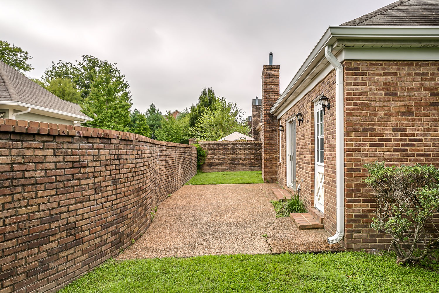 1129 West Main Street, Unit 1 Franklin, TN 37064 - Photo 22 of 30 a view of back yard of the house