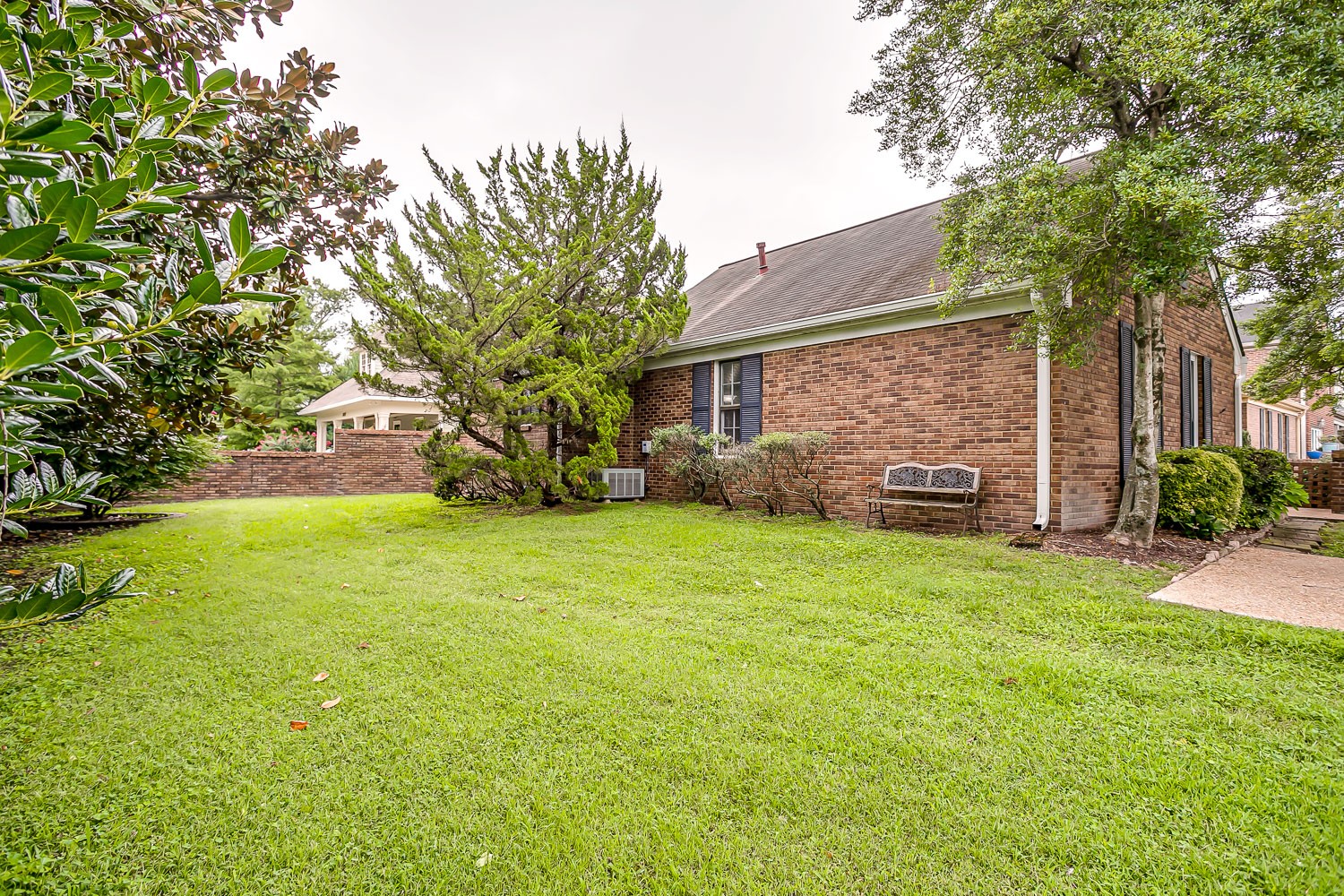 1129 West Main Street, Unit 1 Franklin, TN 37064 - Photo 27 of 30 a view of a house with patio and garden