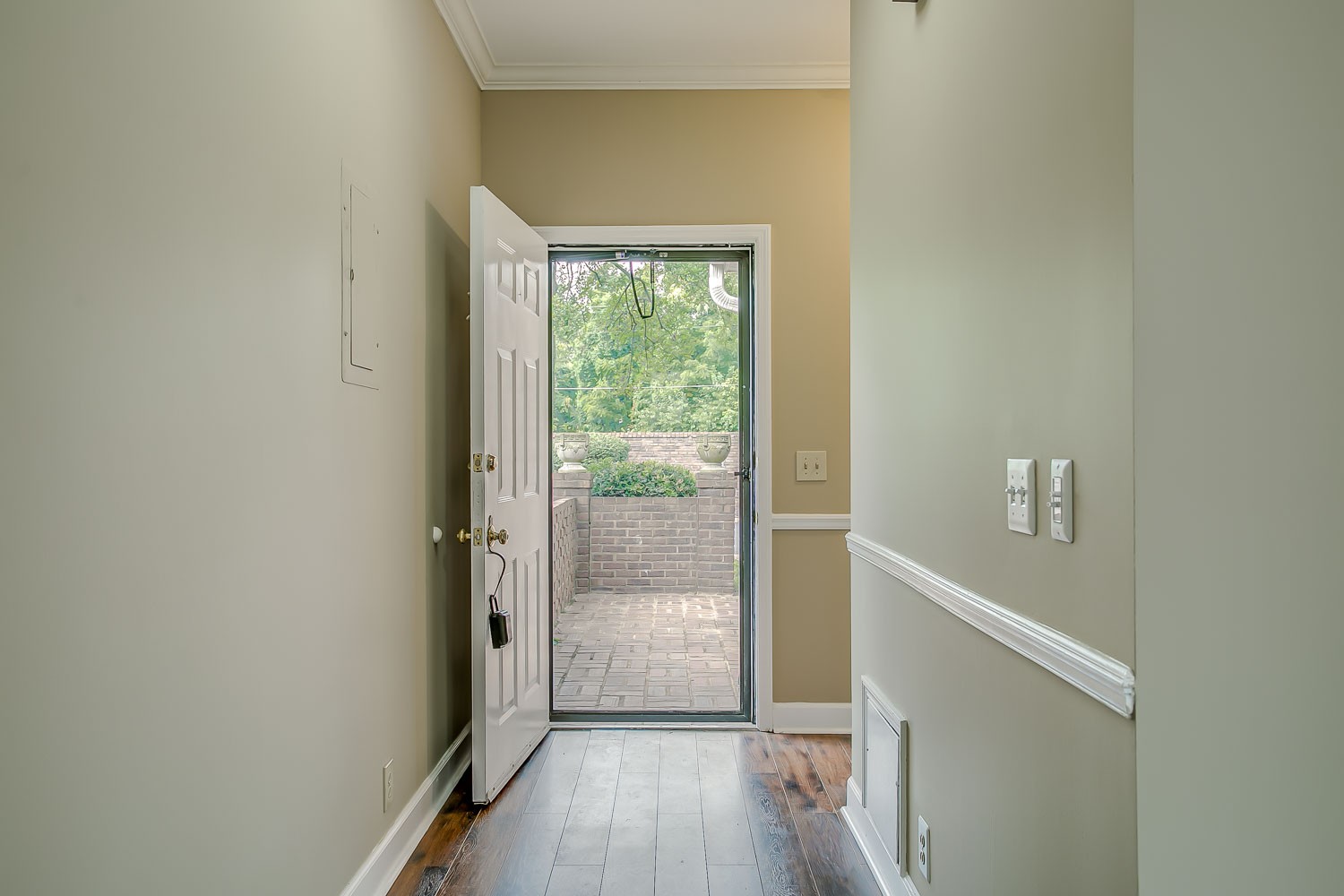 1129 West Main Street, Unit 1 Franklin, TN 37064 - Photo 4 of 30 a view of a hallway with wooden floor and a room