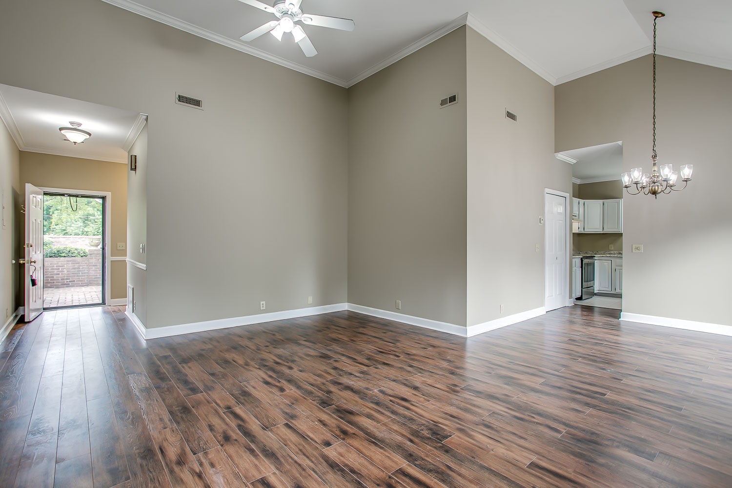 1129 West Main Street, Unit 1 Franklin, TN 37064 - Photo 7 of 30 wooden floor in an empty room with a window