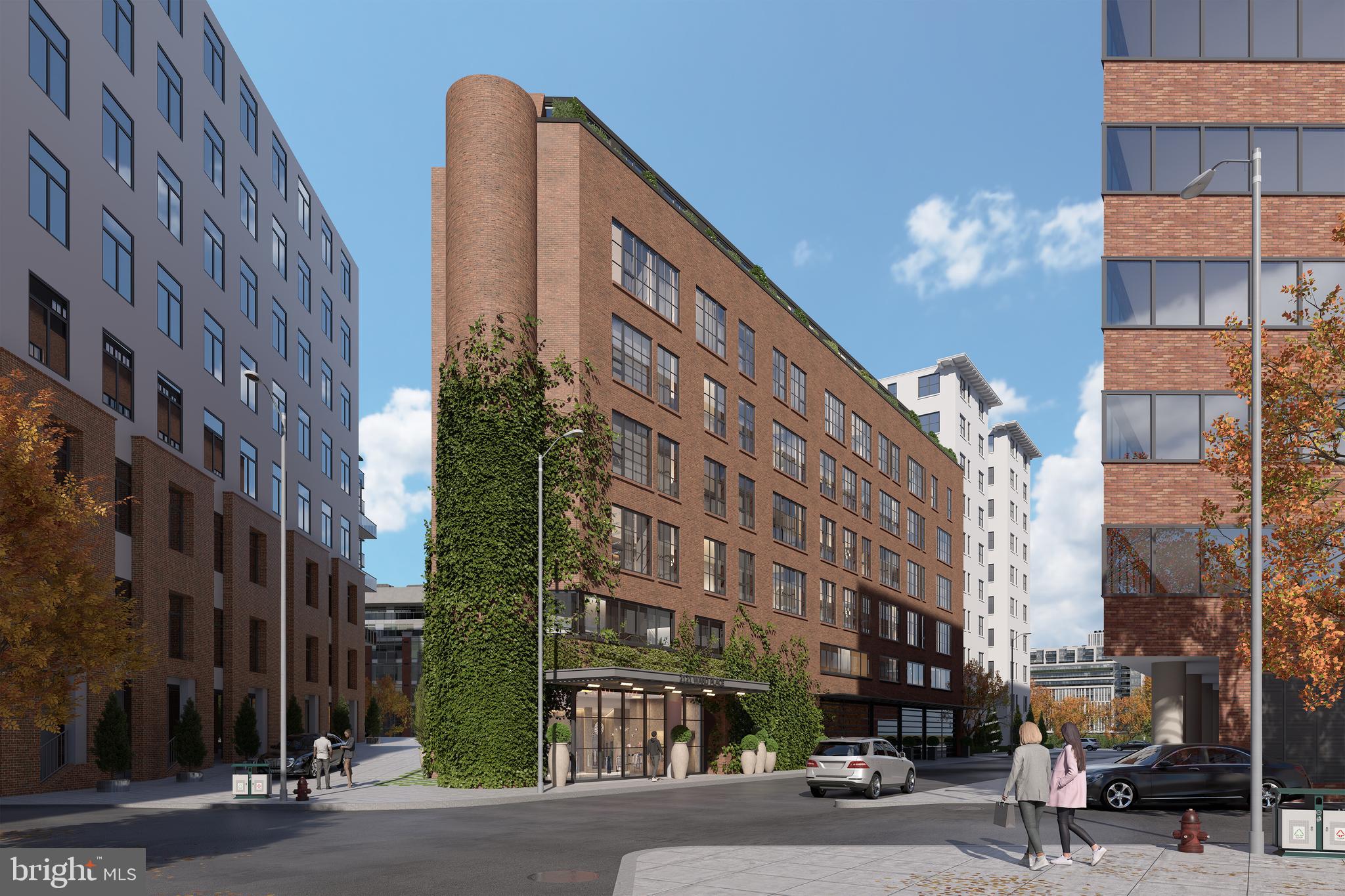 2121 Ward Place Northwest, Unit 405 Washington, DC 20037 - Photo 16 of 18 a view of a building and a street