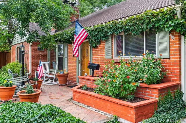 a backyard of a house with seating space