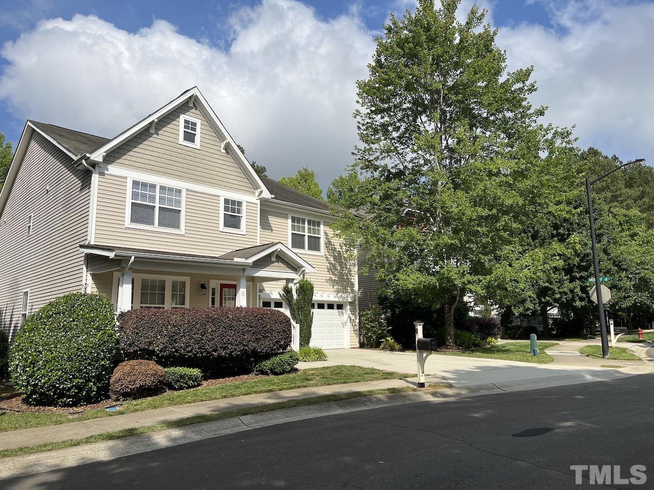 2 Greenway Circle Durham, NC 27705 - Photo 24 of 27 a front view of a house with a yard