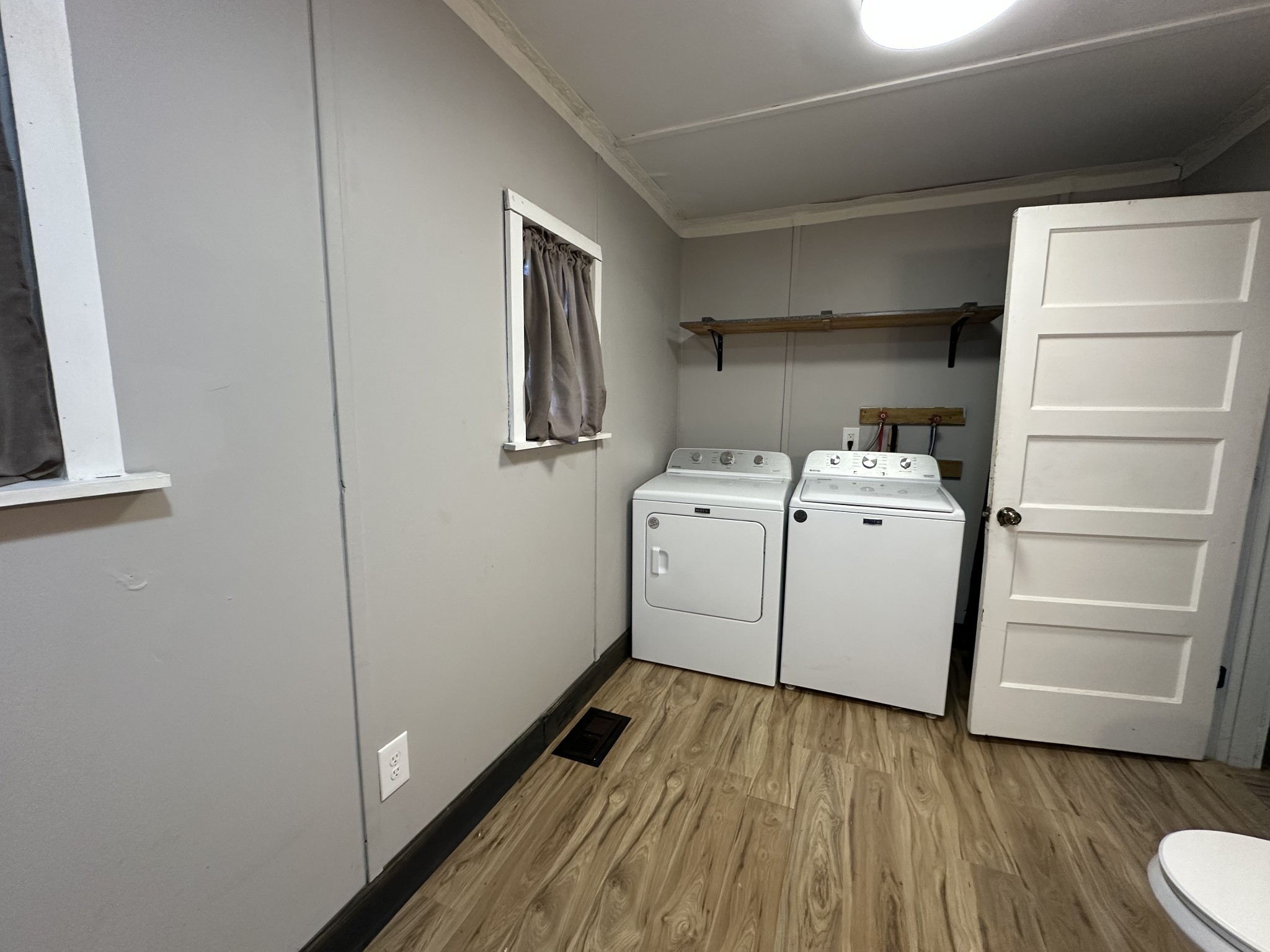 734 Childers Street Pulaski, TN 38478 - Photo 7 of 9 a utility room with washer and dryer