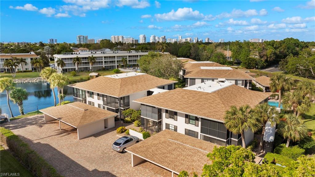 3101 Riviera Drive Naples, FL 34103 - Photo 28 of 41 a view of a city from a terrace