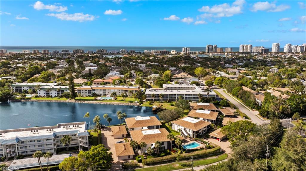 3101 Riviera Drive Naples, FL 34103 - Photo 31 of 41 an aerial view of a city with houses