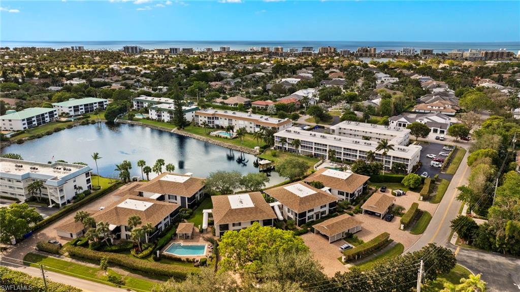 3101 Riviera Drive Naples, FL 34103 - Photo 34 of 41 an aerial view of a house with a ocean view