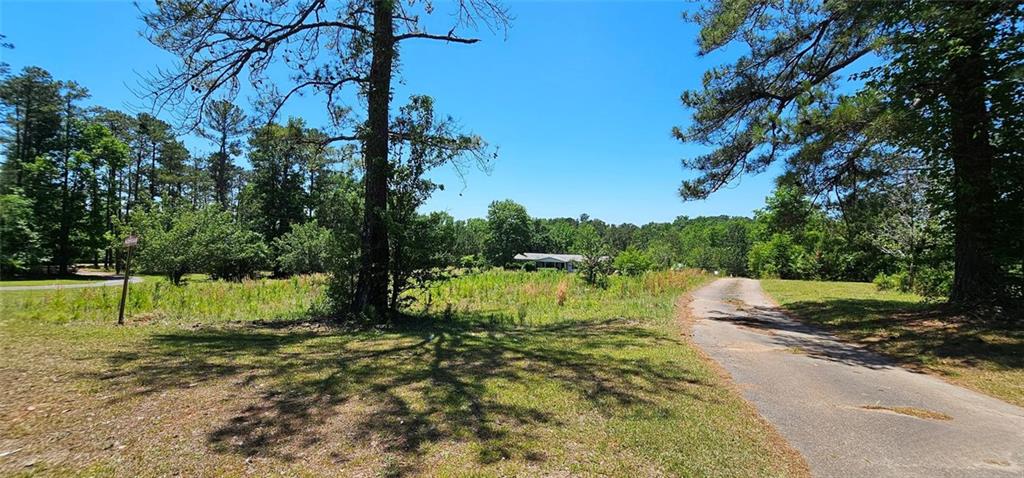 944 Lite-N-Tie Road Macon, GA 31211 - Photo 5 of 36 a backyard of a house with lots of green space