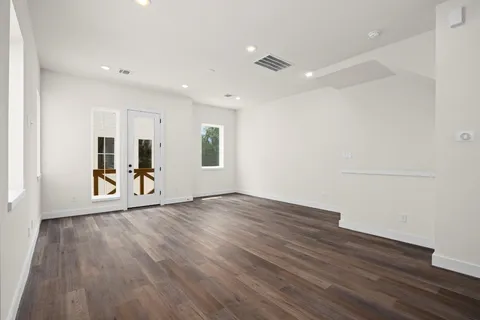 a kitchen with a sink and a stove top oven