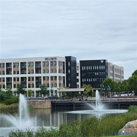 a house with river in front of it