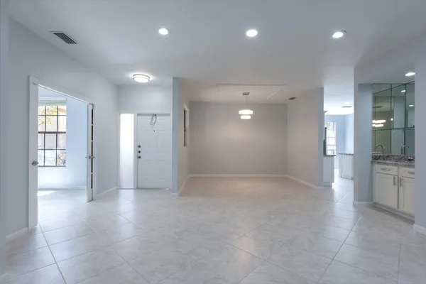 a view of an empty room and a gallery