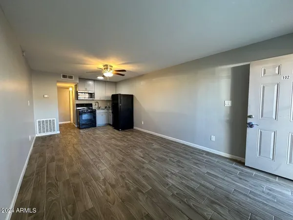 a view of a livingroom with furniture