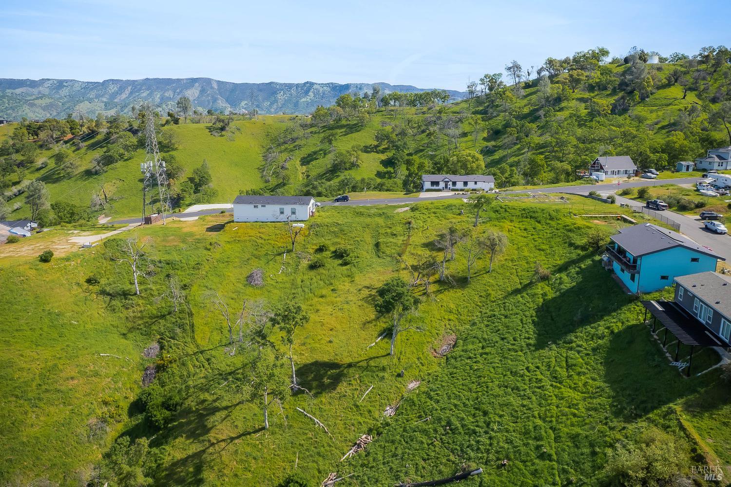 1085 Rimrock Drive Napa, CA 94558 - Photo 15 of 19 a view of a lush green hillside and houses