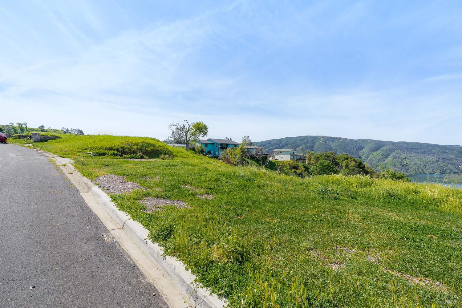 1085 Rimrock Drive Napa, CA 94558 - Photo 5 of 19 a view of a grassy area with an ocean