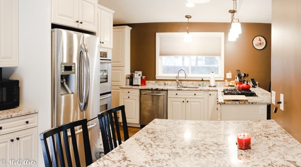 55 Lindsay Road Springfield, MA 01128 - Photo 6 of 18 a kitchen with a sink appliances cabinets and a window