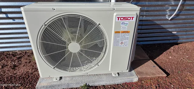 a kitchen with granite countertop a sink stove and cabinets