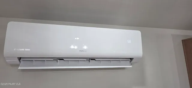 a kitchen with stainless steel appliances a refrigerator and a sink