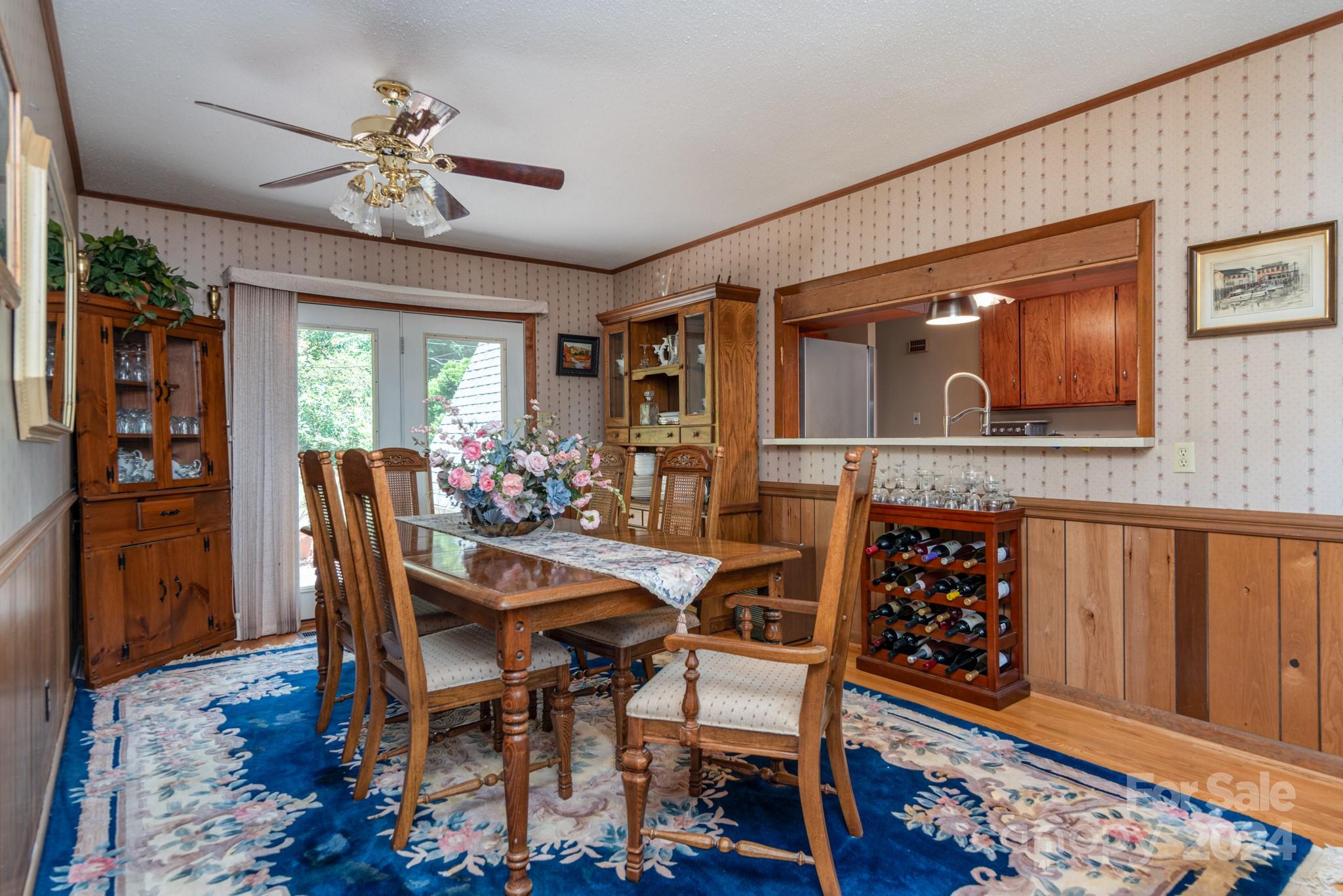 2726 Lake Shore Road South Denver, NC 28037 - Photo 11 of 48 a view of a dining room with furniture and wooden floor