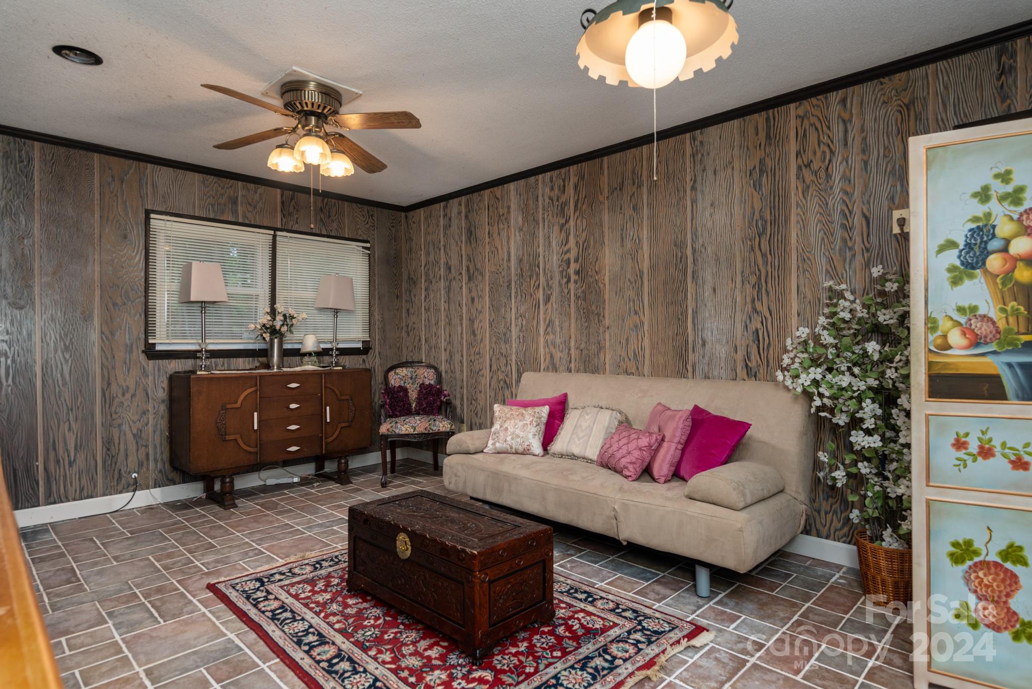 2726 Lake Shore Road South Denver, NC 28037 - Photo 19 of 48 a living room with furniture and a chandelier