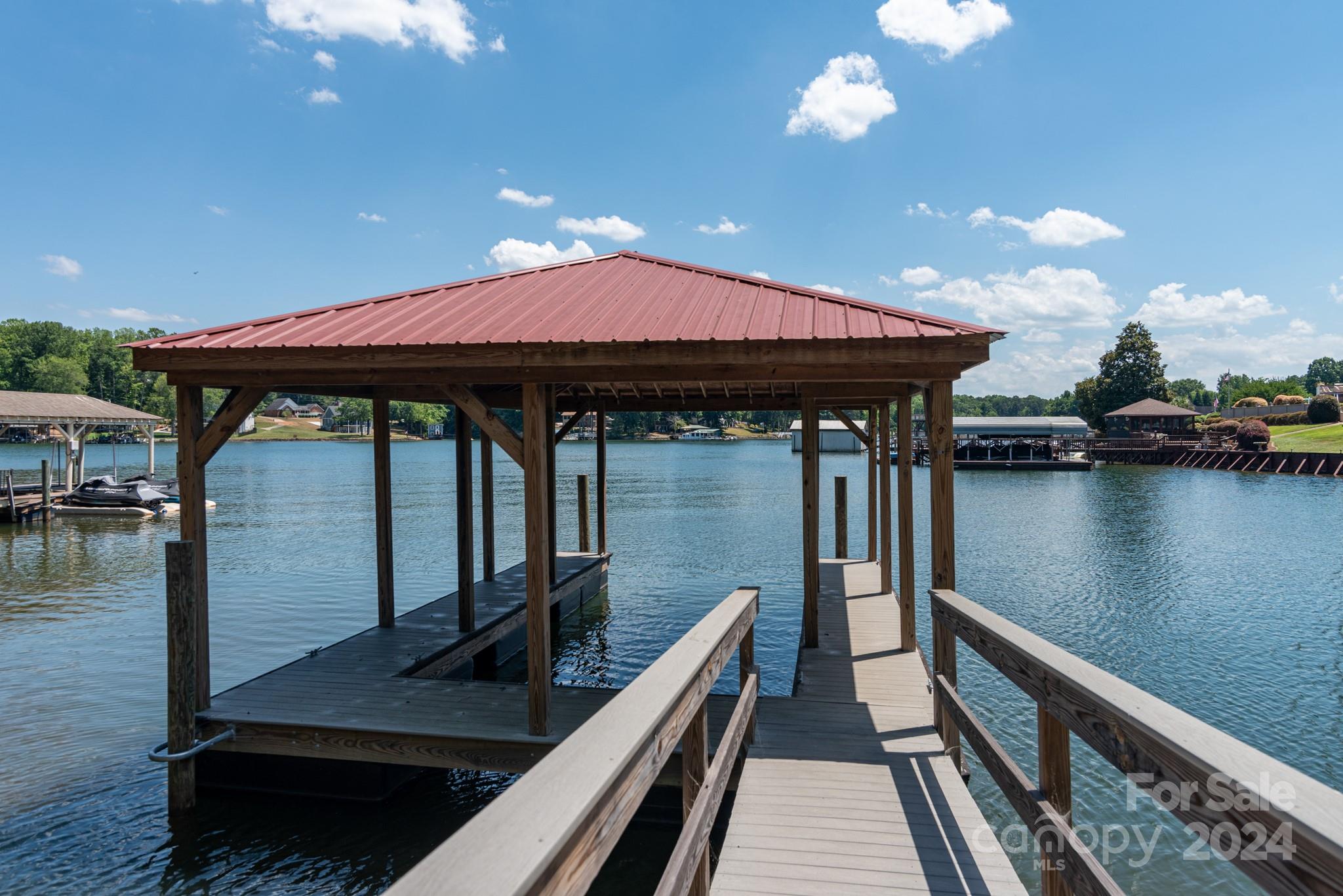2726 Lake Shore Road South Denver, NC 28037 - Photo 31 of 48 a view of a balcony with chairs