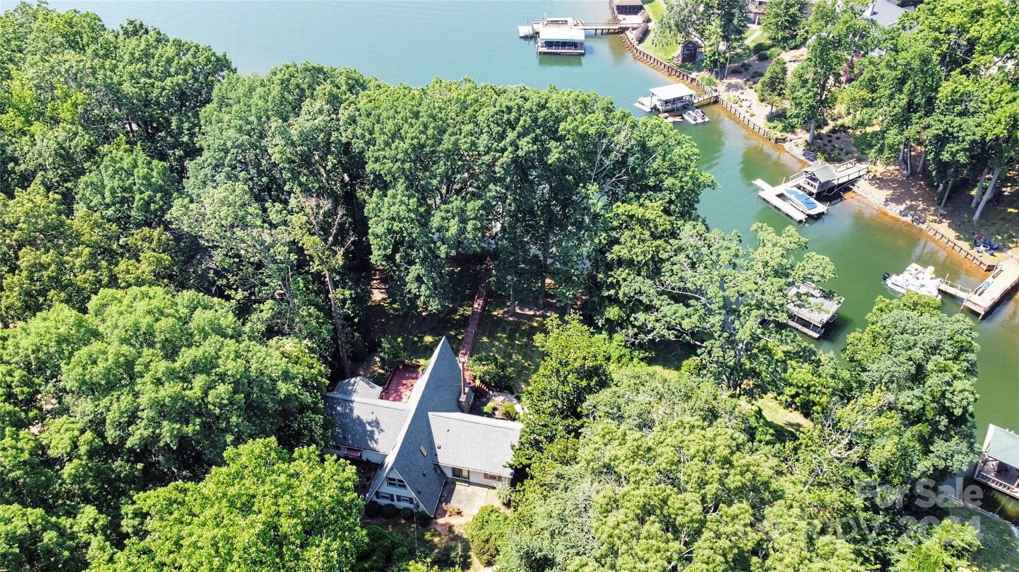 2726 Lake Shore Road South Denver, NC 28037 - Photo 48 of 48 an aerial view of residential house with outdoor space and trees all around
