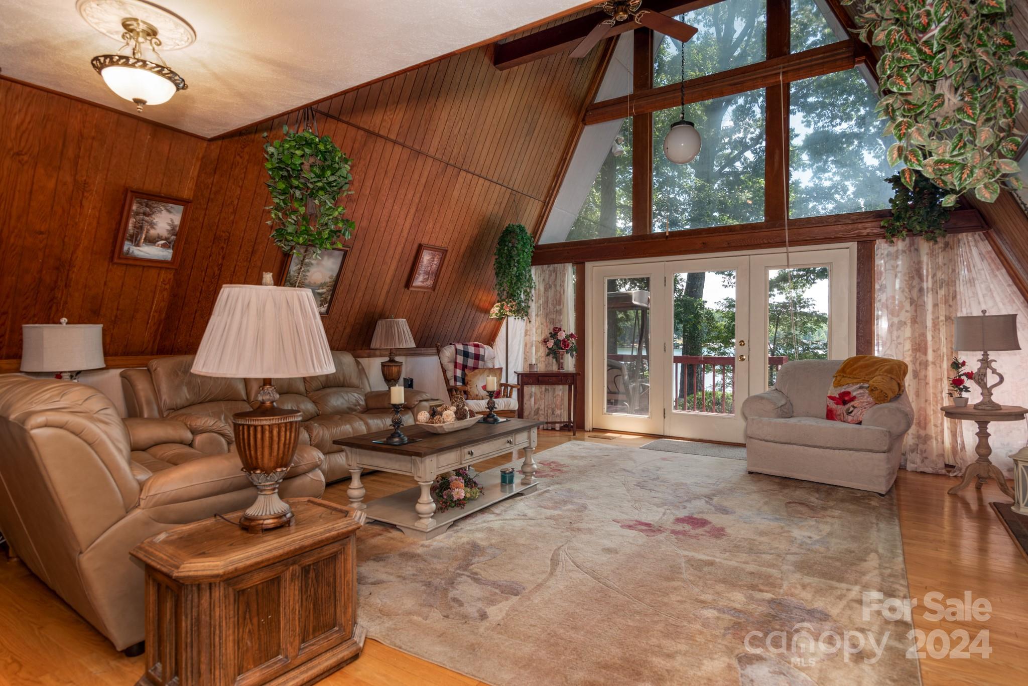 2726 Lake Shore Road South Denver, NC 28037 - Photo 6 of 48 a living room with furniture and a large window