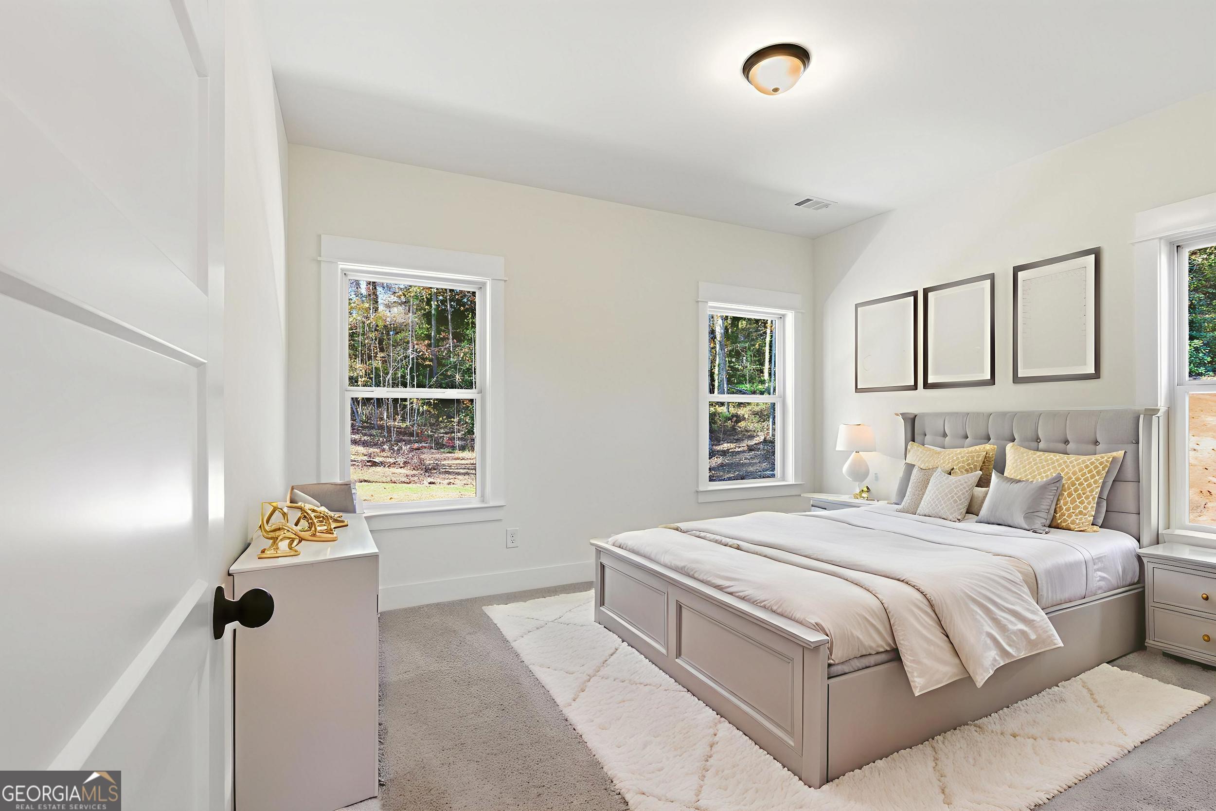 405 Ayers Creek Drive Toccoa, GA 30577 - Photo 20 of 35 a bedroom with a bed and a window