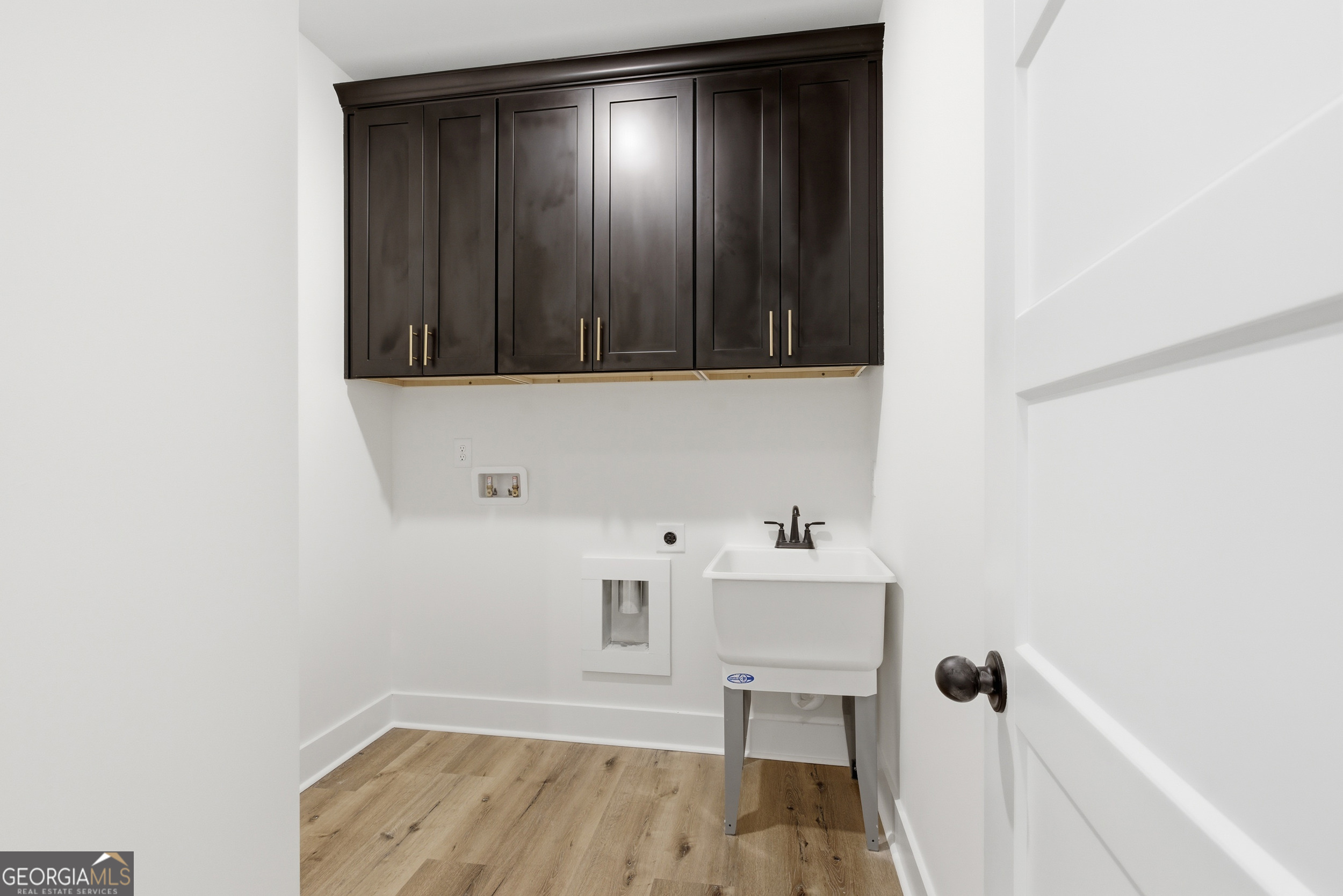 405 Ayers Creek Drive Toccoa, GA 30577 - Photo 26 of 35 a view of walk in closet with wooden floor